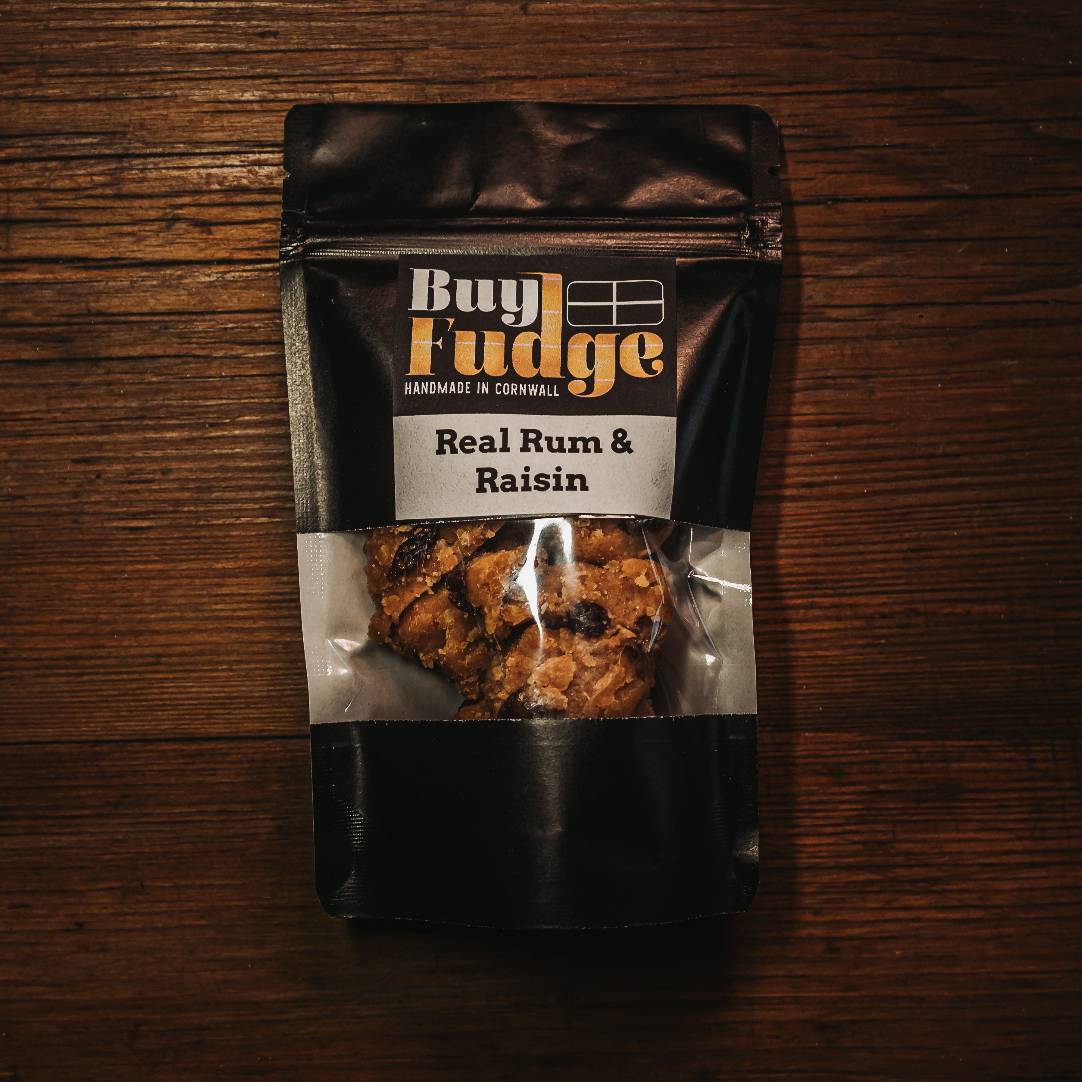 Rum And Raisin Fudge Handmade in Cornwall On A Wooden Background